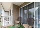 Seating for two on a wooden balcony with view of exterior at 1108 Plaza Walk Dr, Charlotte, NC 28215