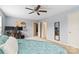 Bedroom showcasing blue walls, ample space, and a view of other rooms at 1108 Plaza Walk Dr, Charlotte, NC 28215