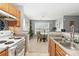 Bright kitchen view leading into dining area with natural light at 1108 Plaza Walk Dr, Charlotte, NC 28215