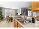 Close-up of kitchen sink area with views into the dining space at 1108 Plaza Walk Dr, Charlotte, NC 28215