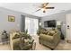 Cozy living room with comfortable seating, natural light, and stylish decor at 1108 Plaza Walk Dr, Charlotte, NC 28215