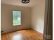 A bright bedroom with hardwood floors and natural light at 1201 Forest Ridge Rd, Bessemer City, NC 28016