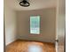 Cozy bedroom with natural light, a simple fan and clean walls at 1201 Forest Ridge Rd, Bessemer City, NC 28016