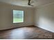Bedroom featuring hardwood floors, a modern ceiling fan and a natural light at 1201 Forest Ridge Rd, Bessemer City, NC 28016