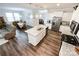 Bright kitchen with stainless appliances and kitchen island overlooks the dining area at 1211 Calder Dr, Indian Trail, NC 28079