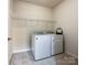 Functional laundry room with modern appliances and plenty of space at 1211 Calder Dr, Indian Trail, NC 28079