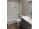 Updated bathroom features a modern vanity, new subway tile, and shower-tub combo at 1228 Archdale Dr # G, Charlotte, NC 28217