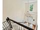 Grand foyer featuring a staircase, chandelier, hardwood floors, and a view of the front door and transom window at 14203 Queens Carriage Pl, Charlotte, NC 28278