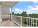 A balcony overlooking a lush green landscape and blue skies at 14347 San Paolo Ln, Charlotte, NC 28277