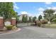 A gated entrance with brick pillars for Belle Vista community at 14347 San Paolo Ln, Charlotte, NC 28277