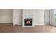 Living room with fireplace and access to patio at 14347 San Paolo Ln, Charlotte, NC 28277