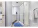 Cozy bathroom with framed shower, vanity, and soft blue accents at 147 Buck And Doe Ln, Statesville, NC 28625