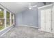 Bright bedroom with plush carpet and large windows offering natural light at 147 Buck And Doe Ln, Statesville, NC 28625