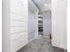 Bright walk-in closet featuring built-in shelving and ample storage space at 147 Buck And Doe Ln, Statesville, NC 28625
