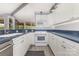 Functional kitchen featuring appliances, ample cabinet space, and a view to the outside at 147 Buck And Doe Ln, Statesville, NC 28625