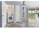 Convenient laundry area featuring stacked washer and dryer at 147 Buck And Doe Ln, Statesville, NC 28625