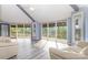 Open concept living room with access to the outdoor deck at 147 Buck And Doe Ln, Statesville, NC 28625