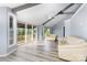 Living room with vaulted ceiling and expansive windows showcasing views at 147 Buck And Doe Ln, Statesville, NC 28625