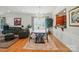 Elegant dining room with hardwood floors, a chandelier, and an open layout at 15116 Legend Oaks Ct, Fort Mill, SC 29707
