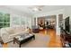 Bright open living space, hardwood floors, ceiling fan and seamless flow to other rooms at 15116 Legend Oaks Ct, Fort Mill, SC 29707