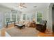 Inviting sunroom with bright natural light and comfortable seating, perfect for relaxation at 15116 Legend Oaks Ct, Fort Mill, SC 29707