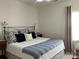 Comfortable bedroom with a large bed, soft bedding, and natural light from a window at 15250 Windward Ln, Lancaster, SC 29720