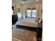 Relaxing bedroom with a window seat, patterned rug, and ample closet space at 15250 Windward Ln, Lancaster, SC 29720
