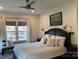 Cozy bedroom with a view of the outdoors and reading lights at 15250 Windward Ln, Lancaster, SC 29720