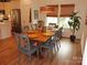 Dining room with a wooden table, seating for six, and natural light at 15250 Windward Ln, Lancaster, SC 29720