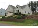 Charming home featuring a well-manicured lawn, beautiful landscaping and a two car garage at 15250 Windward Ln, Lancaster, SC 29720