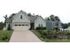 Beautiful exterior of home with well maintained lawn and driveway that leads to a 2 car garage at 15250 Windward Ln, Lancaster, SC 29720