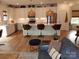 Bright kitchen featuring white cabinets, stainless steel appliances, and an island at 15250 Windward Ln, Lancaster, SC 29720