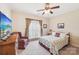 Bedroom with neutral paint and carpet flooring, a ceiling fan, and a window with curtains at 1575 Williamsburg Dr, Rock Hill, SC 29732