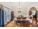 Elegant dining room featuring hardwood floors, classic furnishings, and lots of natural light at 1575 Williamsburg Dr, Rock Hill, SC 29732