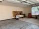 Spacious garage featuring a workbench, tool storage, and ample room for vehicles and projects at 1575 Williamsburg Dr, Rock Hill, SC 29732