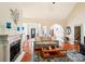 Spacious living room featuring hardwood floors, a fireplace and a view of other rooms in the home at 1575 Williamsburg Dr, Rock Hill, SC 29732