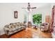 Cozy living room with hardwood floors, ample natural light, and comfortable seating at 1575 Williamsburg Dr, Rock Hill, SC 29732