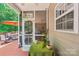 Relax on this charming porch with a screened door, views of the patio, and space for outdoor dining at 1575 Williamsburg Dr, Rock Hill, SC 29732