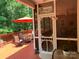Screened-in porch with an outdoor dining set, ceiling fan, and scenic views at 1575 Williamsburg Dr, Rock Hill, SC 29732