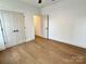 Bedroom with closet and hardwood floors; featuring ample light at 1721 S New Hope Rd, Gastonia, NC 28054