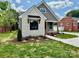 Charming home with stone facade, well-manicured lawn, and inviting curb appeal at 1721 S New Hope Rd, Gastonia, NC 28054
