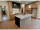 Beautiful open concept kitchen with custom cabinetry, granite countertops, and hardwood flooring at 1721 S New Hope Rd, Gastonia, NC 28054