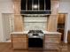 Modern kitchen featuring stainless steel appliances, custom cabinets, and granite countertops at 1721 S New Hope Rd, Gastonia, NC 28054