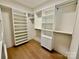 Spacious walk-in closet with custom shelving and modern organizers at 1721 S New Hope Rd, Gastonia, NC 28054
