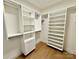 Spacious walk-in closet with custom shelving and modern organizers at 1721 S New Hope Rd, Gastonia, NC 28054