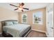 A comfortable bedroom with neutral colors and window light at 207 Spaniel Se Dr, Concord, NC 28025
