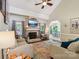 Spacious living room with fireplace, and comfortable seating, perfect for gatherings at 207 Spaniel Se Dr, Concord, NC 28025