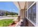 Inviting covered front porch with stone accents and view of the neighborhood street at 2527 Linhay Dr, Charlotte, NC 28216