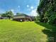 Backyard view of the home's exterior and large lawn at 2541 26Th Ne Ave, Hickory, NC 28601