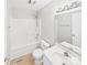Well-maintained bathroom featuring white fixtures, tile floors, and shower-tub combo at 2541 26Th Ne Ave, Hickory, NC 28601